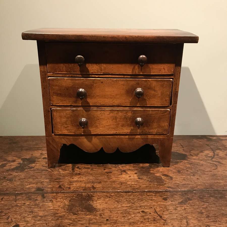 19th c. miniature chest of drawers in walnut