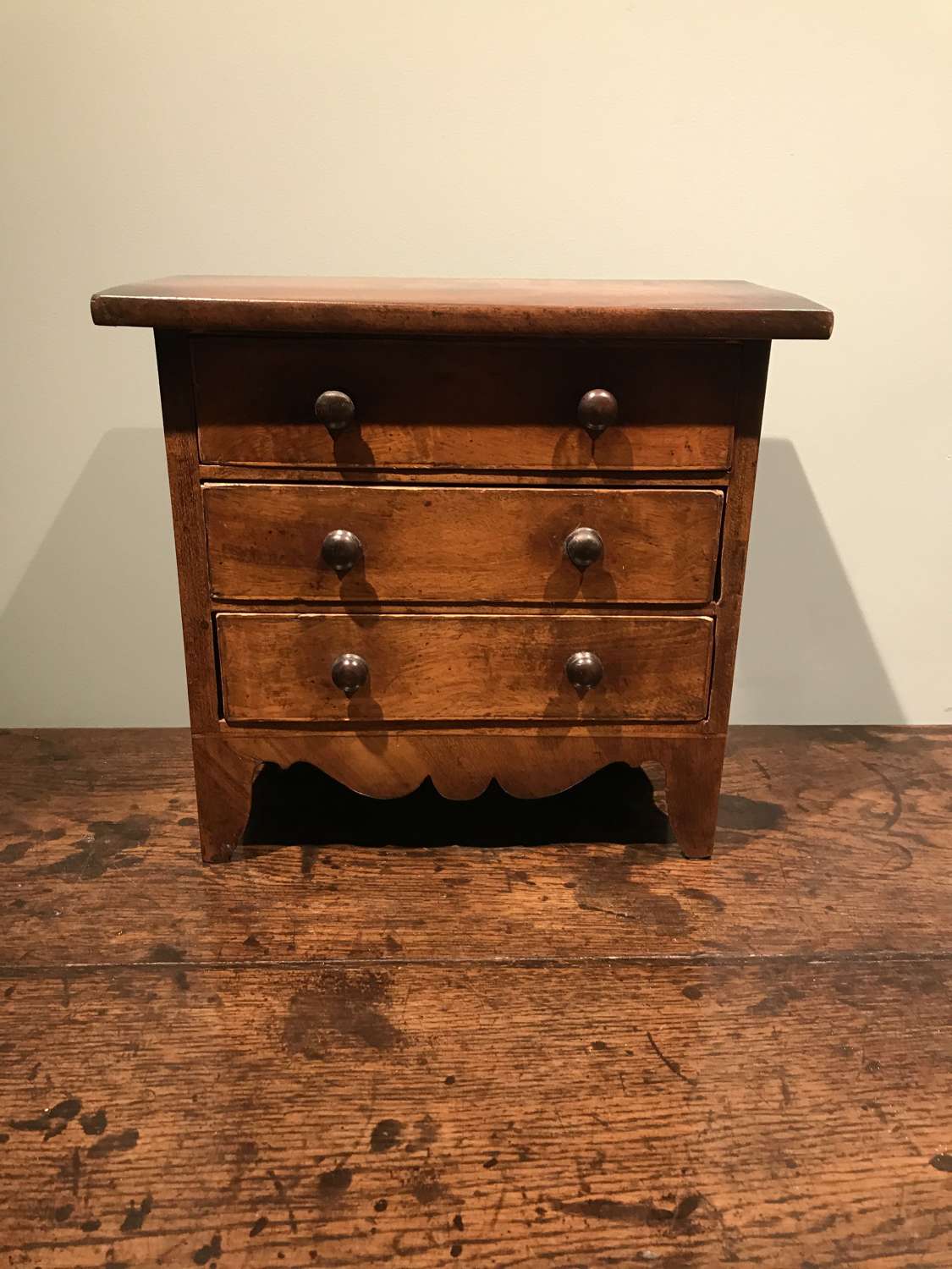 19th c. miniature chest of drawers in walnut