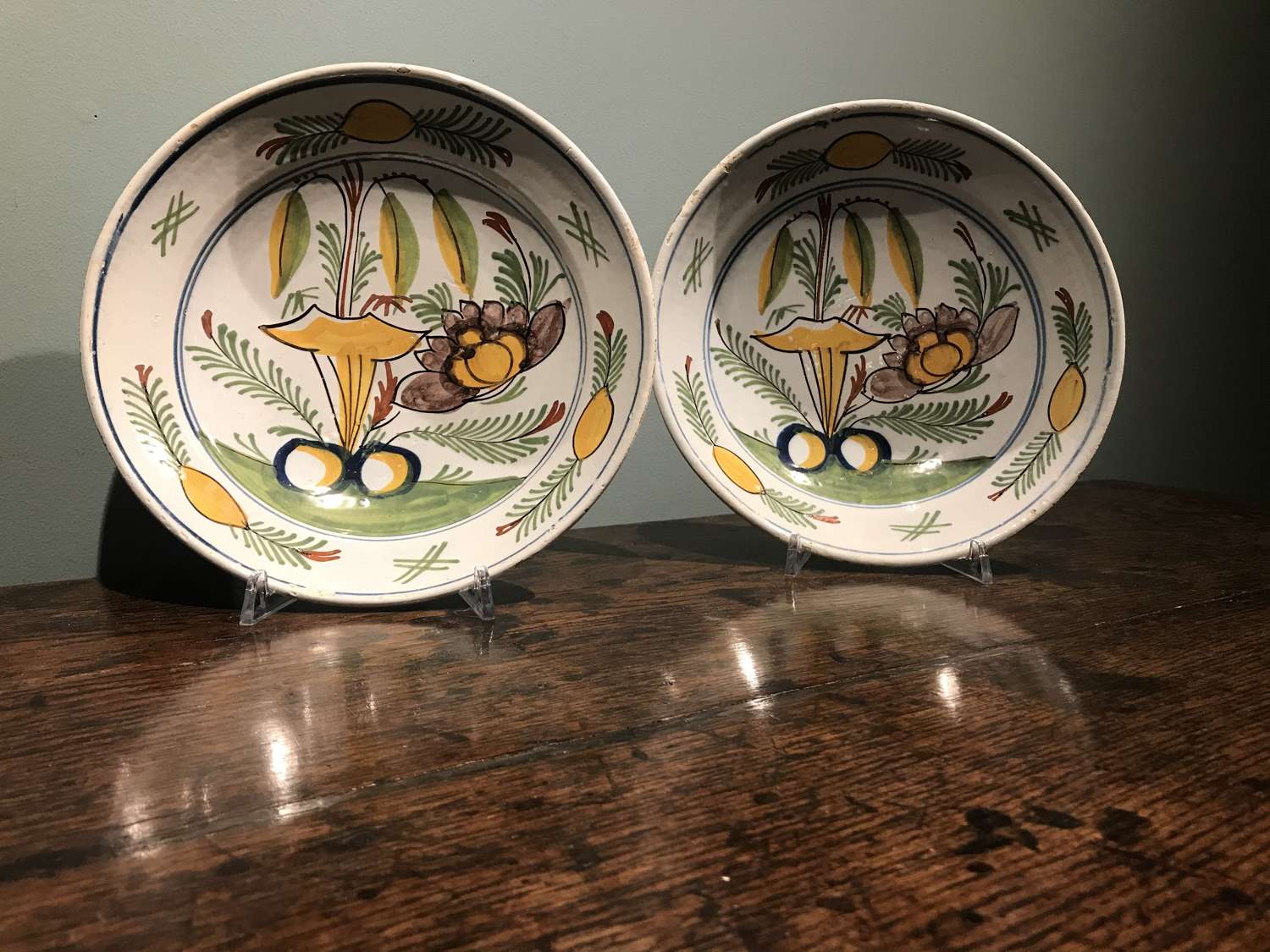A pair of Dutch Delft polychrome dishes