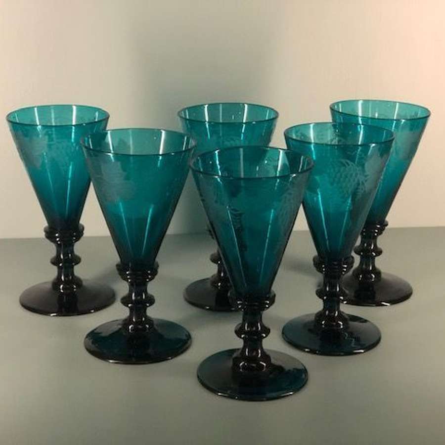 Set of 6 teal green Georgian wine glasses with engraved grape motifs