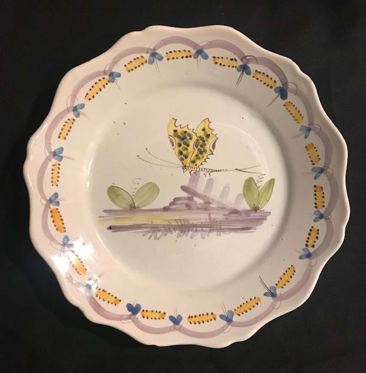 18th century French faience plate with Butterfly