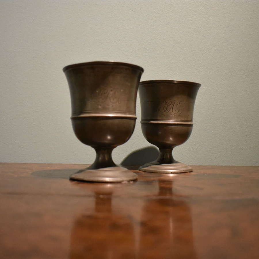A pair of 19th century pewter goblets